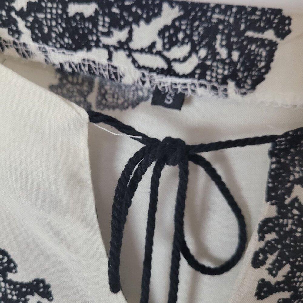Boho-Inspired Cream & Black Tunic Dress With Tassel Tie Neckline And 3/4 Sleeves - Picture 6 of 12